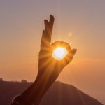 photography-of-hand-during-sunset-760680